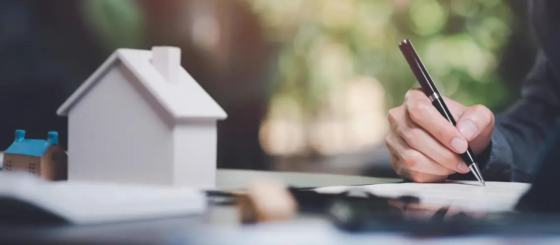 Professional conducting property valuation in Queensland